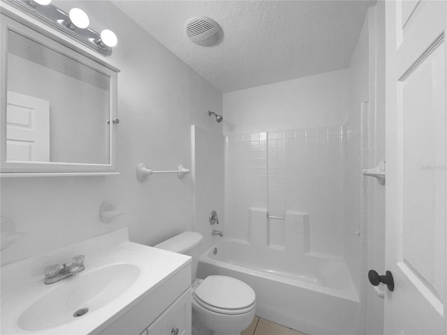 1877 Courtland Blvd, Deltona, FL 32738 - bathroom with a textured ceiling, vanity, bathing tub / shower combination, and tile patterned floors