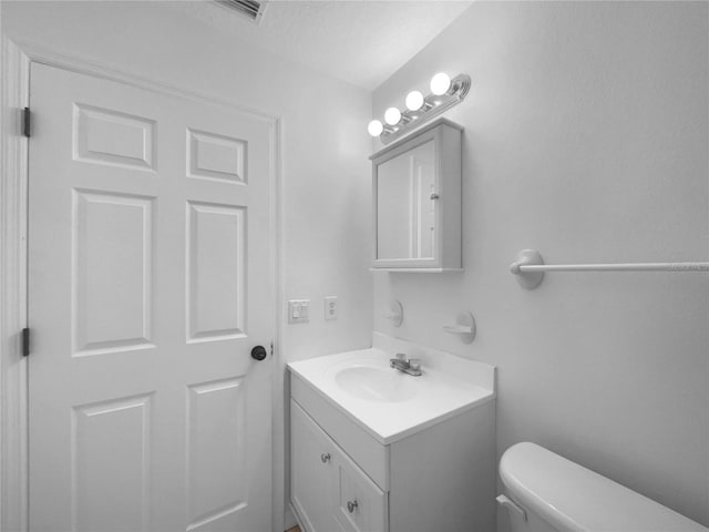 1877 Courtland Blvd, Deltona, FL 32738 - bathroom with vanity and toilet