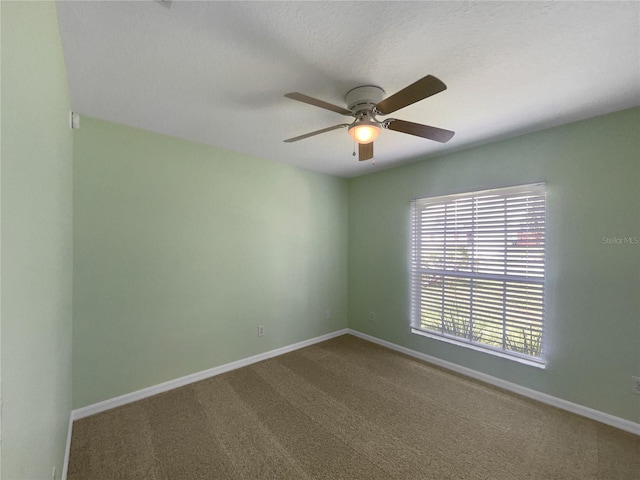 1877 Courtland Blvd, Deltona, FL 32738 - carpeted empty room featuring a ceiling fan and baseboards