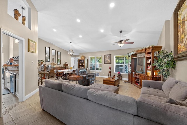 5704 Bay Side Dr, Orlando, FL 32819 - living room with light tile patterned floors, a ceiling fan, recessed lighting, lofted ceiling, and wine cooler
