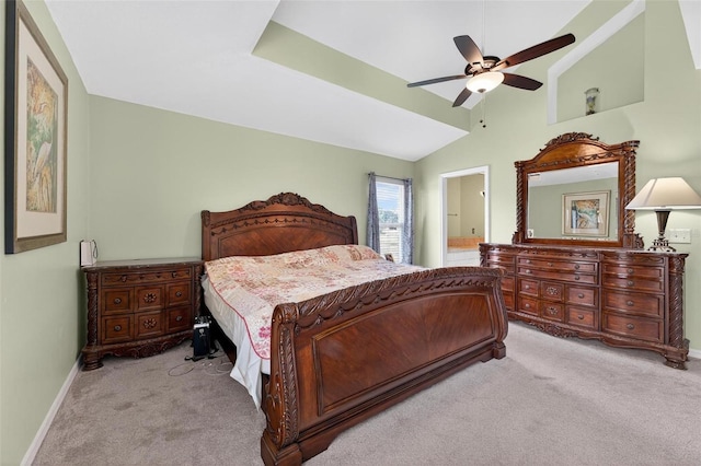 5704 Bay Side Dr, Orlando, FL 32819 - carpeted bedroom featuring vaulted ceiling, ceiling fan, and connected bathroom