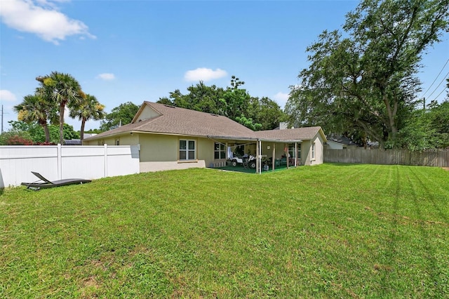 5704 Bay Side Dr, Orlando, FL 32819 - back of house featuring a fenced backyard, stucco siding, and a patio