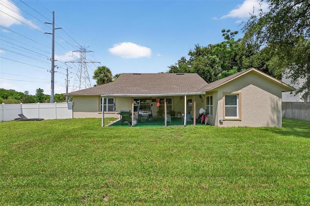 5704 Bay Side Dr, Orlando, FL 32819 - back of house with stucco siding, a patio, and roof with shingles