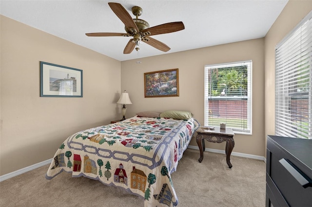 5704 Bay Side Dr, Orlando, FL 32819 - bedroom with light carpet and ceiling fan