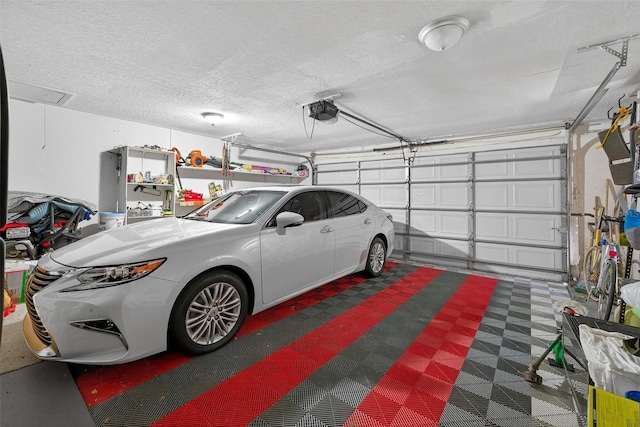 5704 Bay Side Dr, Orlando, FL 32819 - garage featuring a garage door opener