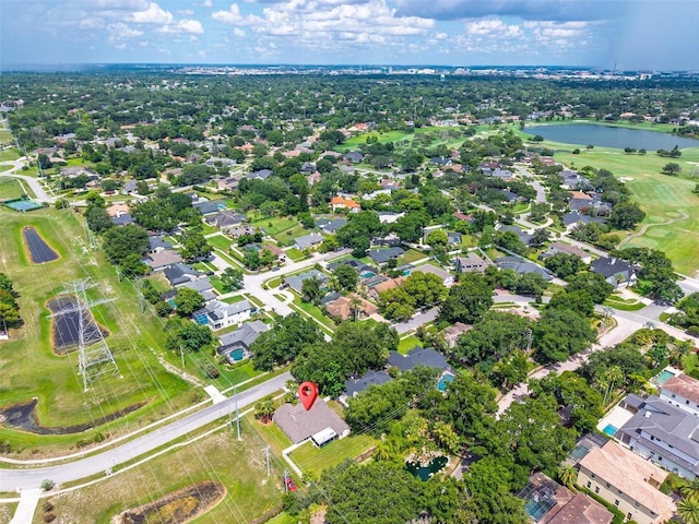 5704 Bay Side Dr, Orlando, FL 32819 - aerial view of property and surrounding area with a nearby body of water, nearby suburban area, and a local golf course