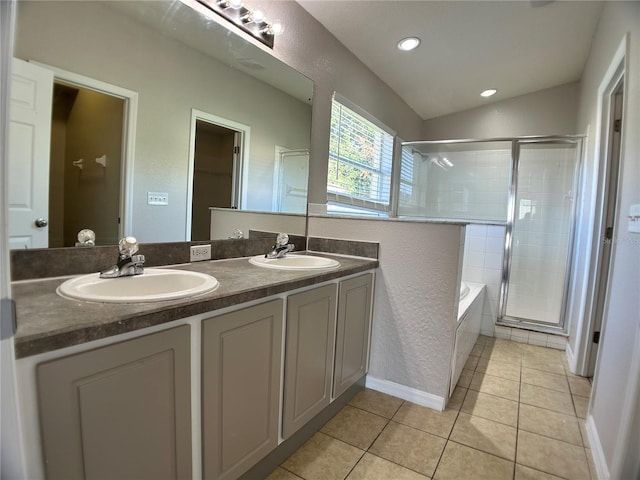 1433 Bluff Loop, Dundee, FL 33838 - bathroom with tile patterned floors, double vanity, a garden tub, tiled shower, and recessed lighting