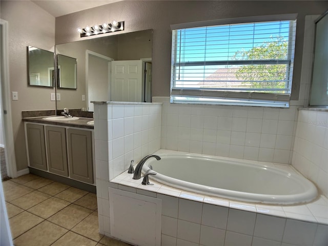 1433 Bluff Loop, Dundee, FL 33838 - bathroom with vanity, a bath, tile patterned flooring, and a textured wall