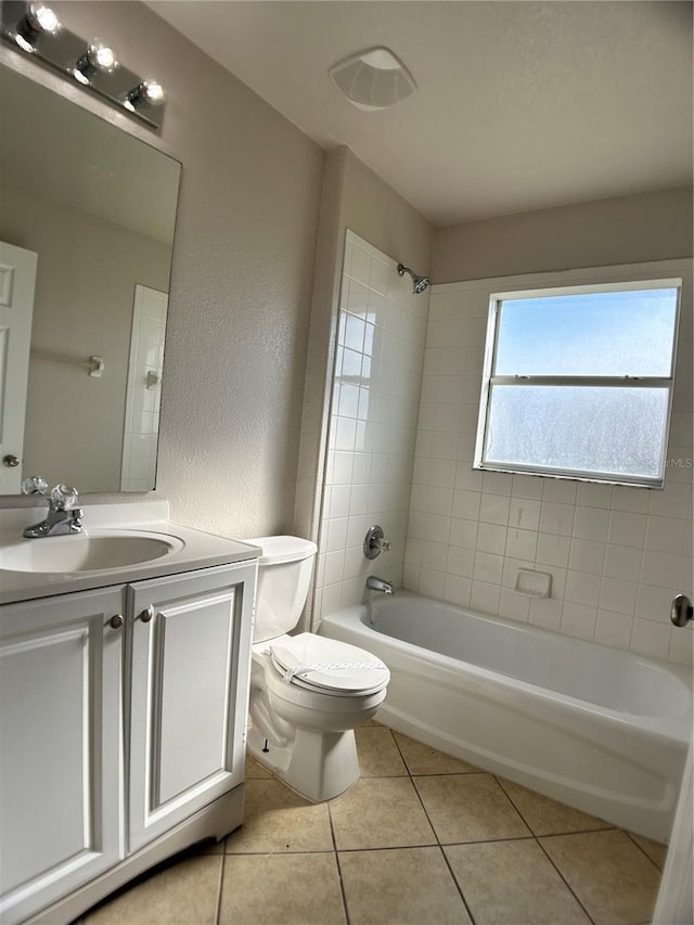 1433 Bluff Loop, Dundee, FL 33838 - full bathroom featuring  shower combination, vanity, tile patterned floors, and a textured wall