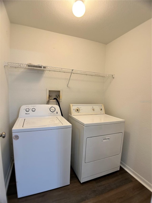 1433 Bluff Loop, Dundee, FL 33838 - laundry room featuring washing machine and clothes dryer and dark wood-style flooring