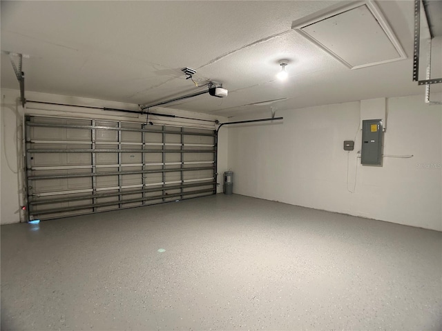 1433 Bluff Loop, Dundee, FL 33838 - garage featuring electric panel and a garage door opener