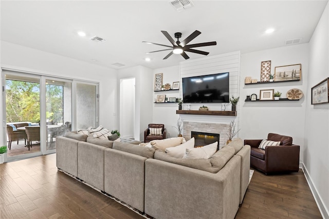 15343 Lebeau Loop, Winter Garden, FL 34787 - living room with a ceiling fan, a stone fireplace, dark wood-style flooring, and recessed lighting