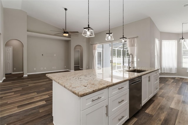 2865 Ashton Ter, Oviedo, FL 32765 - kitchen featuring arched walkways, stainless steel dishwasher, a ceiling fan, dark wood-style floors, and lofted ceiling