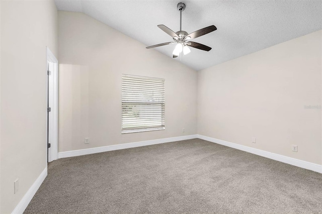 9558 Lupine Ave, Orlando, FL 32824 - carpeted spare room featuring a ceiling fan and vaulted ceiling