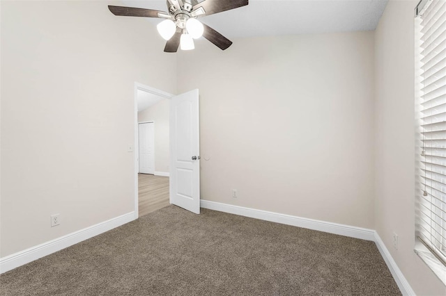 9558 Lupine Ave, Orlando, FL 32824 - spare room featuring carpet and a ceiling fan