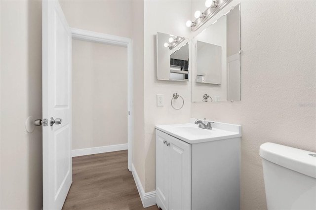 9558 Lupine Ave, Orlando, FL 32824 - bathroom featuring vanity and wood finished floors