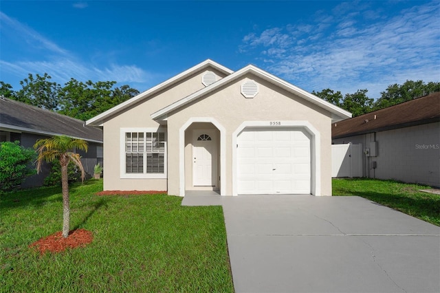 9558 Lupine Ave, Orlando, FL 32824 - ranch-style home with stucco siding, a front yard, driveway, and a garage