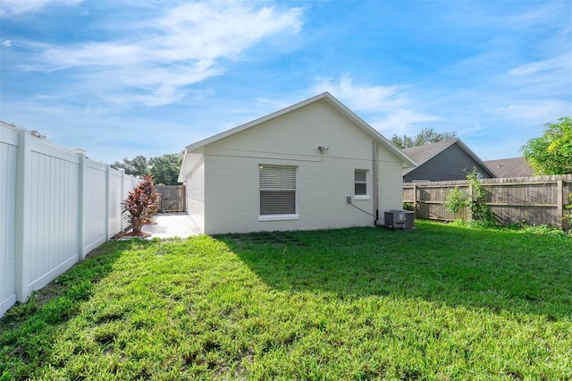9558 Lupine Ave, Orlando, FL 32824 - rear view of house featuring a fenced backyard