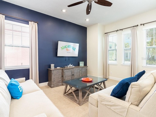 3004 Latitude Ln, Kissimmee, FL 34747 - living area with a ceiling fan, recessed lighting, and light colored carpet
