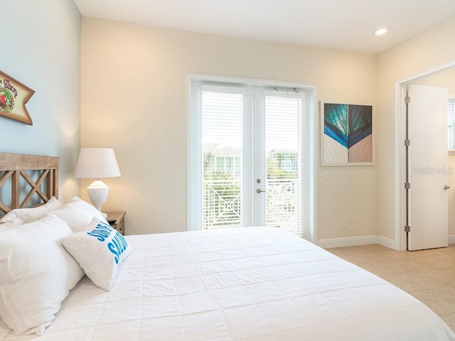 3004 Latitude Ln, Kissimmee, FL 34747 - tiled bedroom with access to exterior, french doors, and recessed lighting