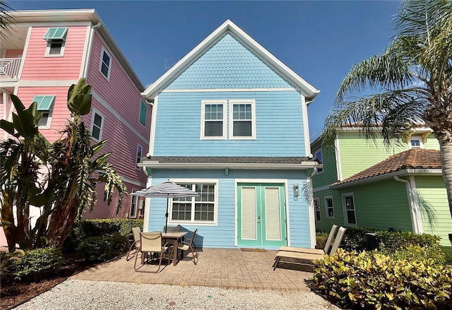3004 Latitude Ln, Kissimmee, FL 34747 - back of property featuring a patio and french doors