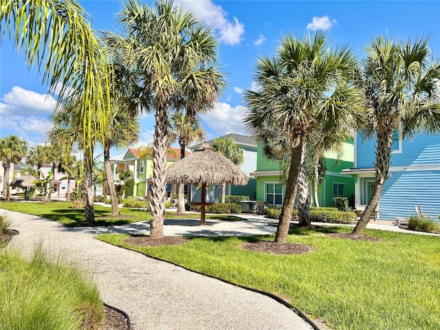 3004 Latitude Ln, Kissimmee, FL 34747 - surrounding community with a lawn