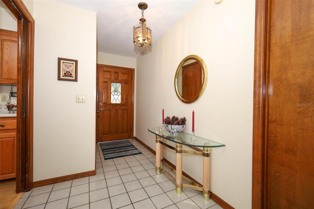 1121 Winged Foot Cir, Winter Springs, FL 32708 - foyer featuring a chandelier and light tile patterned floors