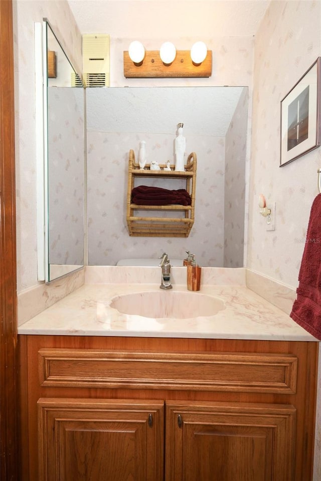 1121 Winged Foot Cir, Winter Springs, FL 32708 - bathroom featuring vanity and wallpapered walls