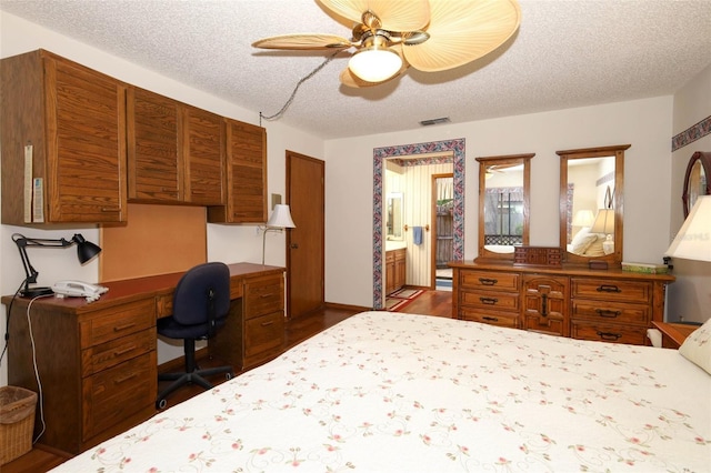 1121 Winged Foot Cir, Winter Springs, FL 32708 - bedroom featuring an office area, wood finished floors, a textured ceiling, and ceiling fan