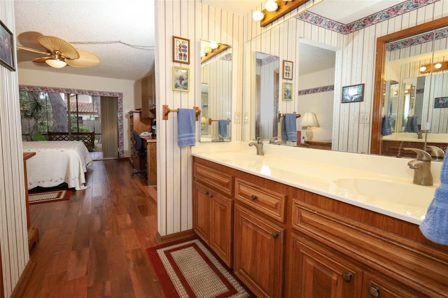 1121 Winged Foot Cir, Winter Springs, FL 32708 - ensuite bathroom featuring wood finished floors and double vanity