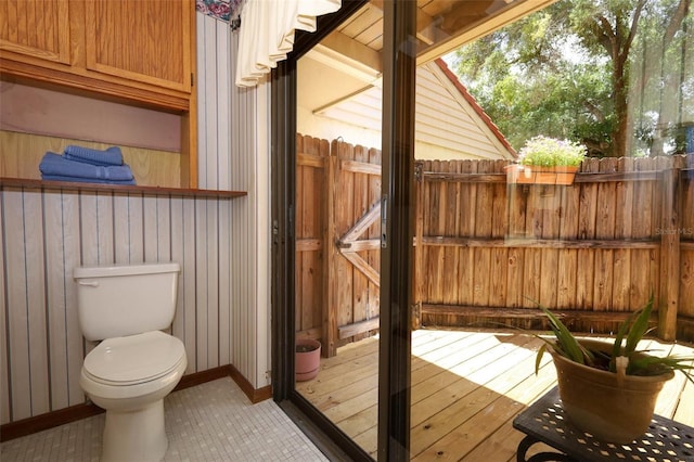 1121 Winged Foot Cir, Winter Springs, FL 32708 - bathroom featuring toilet and wooden walls