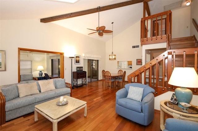1121 Winged Foot Cir, Winter Springs, FL 32708 - living room with a ceiling fan, stairs, wood finished floors, high vaulted ceiling, and beamed ceiling