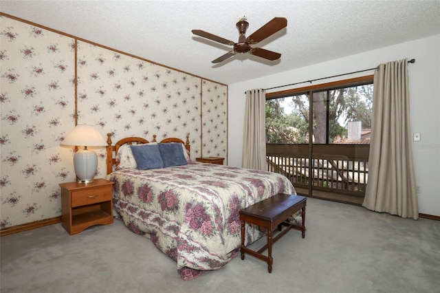 1121 Winged Foot Cir, Winter Springs, FL 32708 - bedroom featuring access to exterior, wallpapered walls, carpet, a textured ceiling, and a ceiling fan