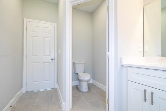 bathroom featuring vanity and tile patterned flooring