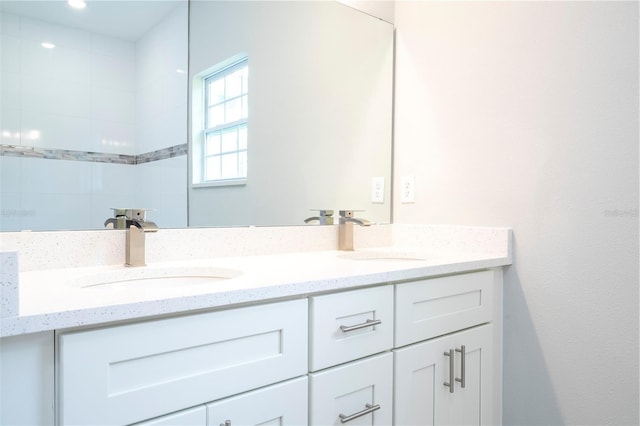 full bath featuring double vanity