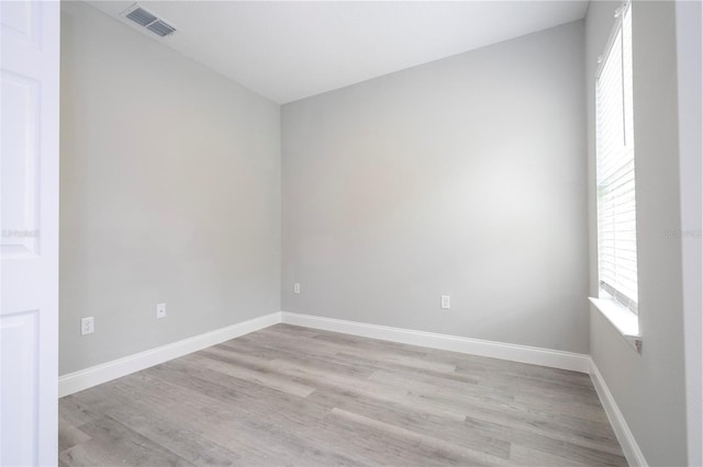 empty room with light wood-type flooring