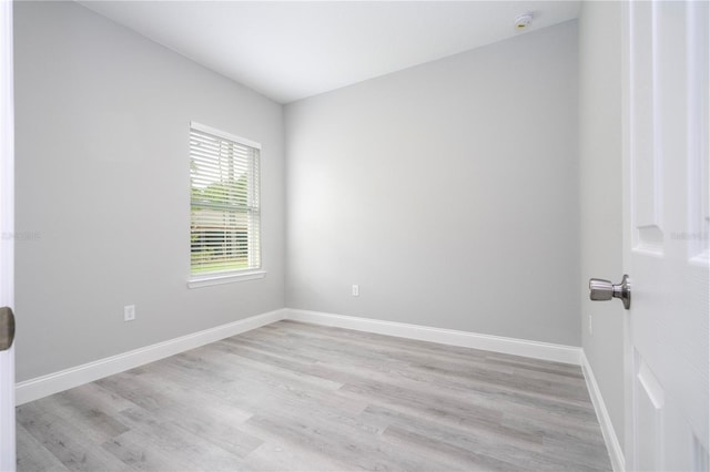 empty room with light wood-type flooring