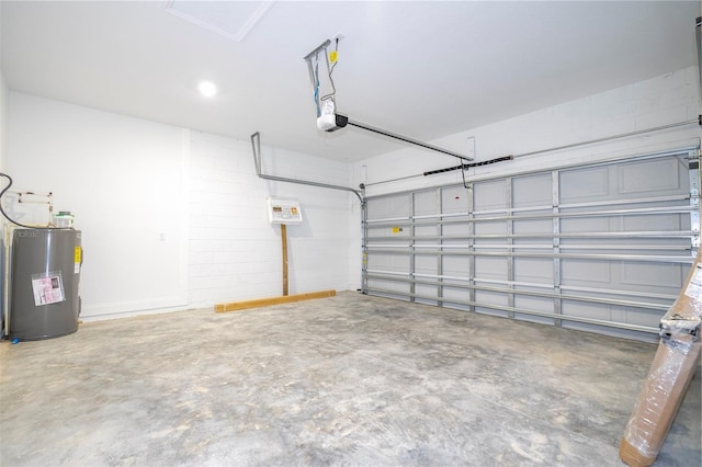 garage with electric water heater and a garage door opener