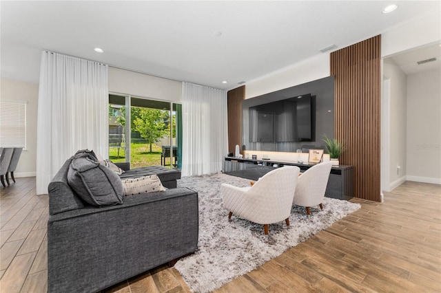 15716 Sweet Lemon Way, Winter Garden, FL 34787 - living room with wood finished floors and recessed lighting