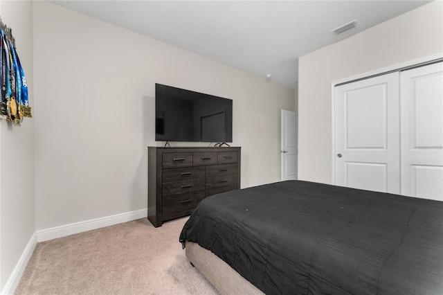 15716 Sweet Lemon Way, Winter Garden, FL 34787 - carpeted bedroom featuring baseboards and a closet