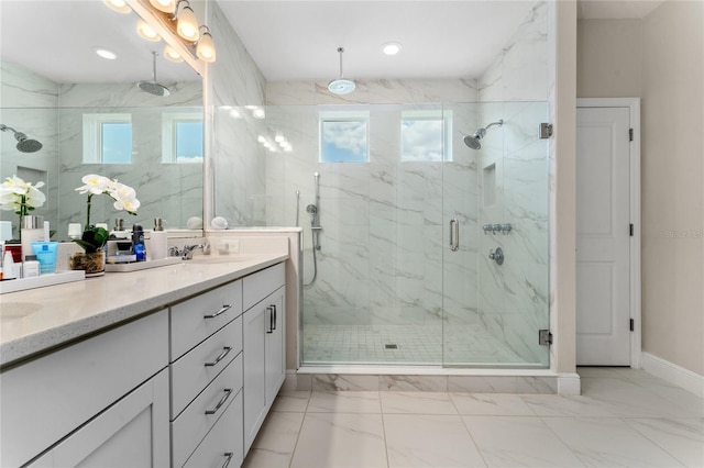 15716 Sweet Lemon Way, Winter Garden, FL 34787 - full bathroom featuring a marble finish shower, double vanity, marble finish flooring, and recessed lighting