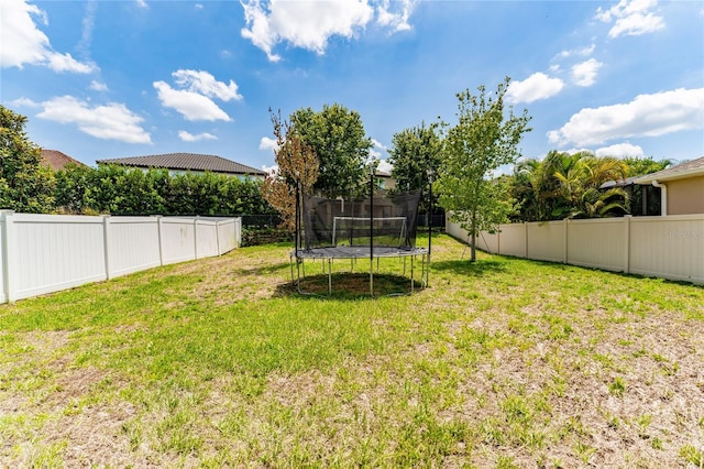 15716 Sweet Lemon Way, Winter Garden, FL 34787 - fenced backyard with a trampoline