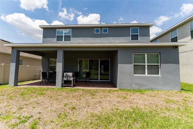 15716 Sweet Lemon Way, Winter Garden, FL 34787 - back of house with a patio area and stucco siding