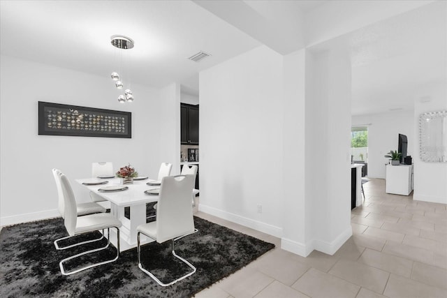 1156 Cavender Creek Rd, Minneola, FL 34715 - dining area with baseboards and light tile patterned floors