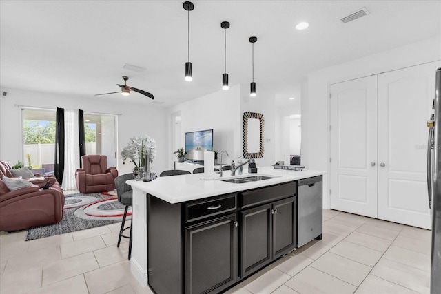 1156 Cavender Creek Rd, Minneola, FL 34715 - kitchen featuring dishwasher, open floor plan, light countertops, pendant lighting, and light tile patterned floors
