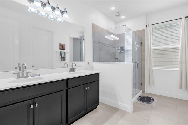 1156 Cavender Creek Rd, Minneola, FL 34715 - full bathroom with double vanity, tile patterned flooring, and a stall shower