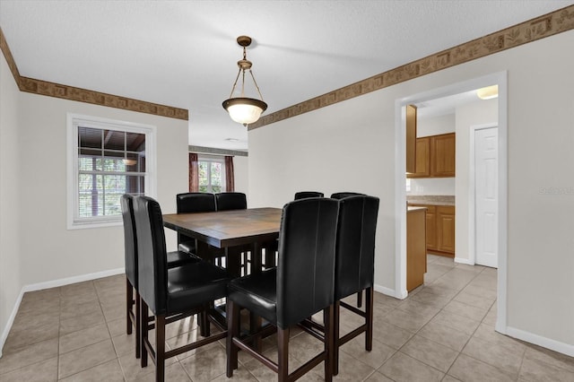 14402 SW 34th Terrace Rd, Ocala, FL 34473 - dining room with light tile patterned floors and a textured ceiling
