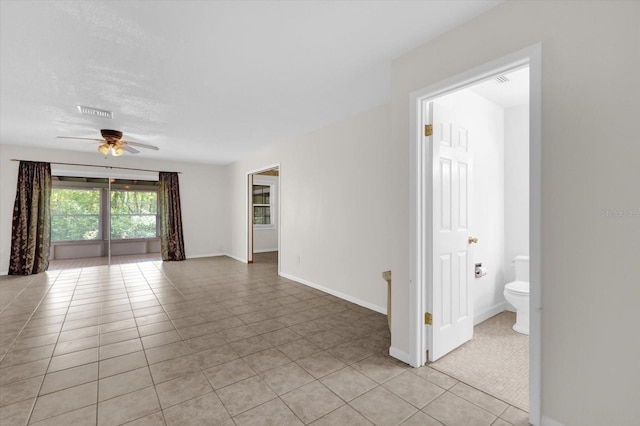 14402 SW 34th Terrace Rd, Ocala, FL 34473 - empty room featuring light tile patterned flooring and ceiling fan