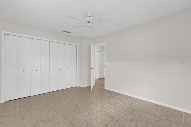 14402 SW 34th Terrace Rd, Ocala, FL 34473 - unfurnished bedroom featuring a closet and ceiling fan