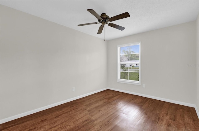 14402 SW 34th Terrace Rd, Ocala, FL 34473 - empty room featuring wood finished floors and a ceiling fan